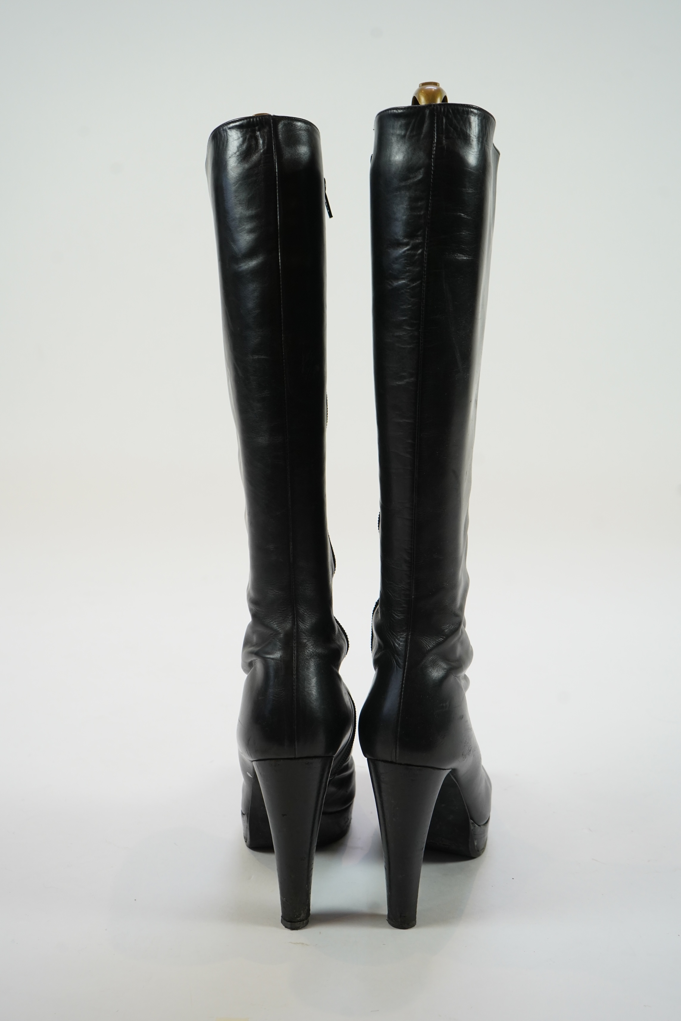 A pair of lady's Prada black leather boots and a pair of Russell & Bromley platform black leather knee high boots. size EU 40 (approx UK size 7.5)